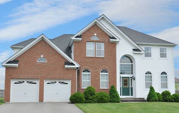 2-story single-family home with an immaculate front yard in Corinth, TX